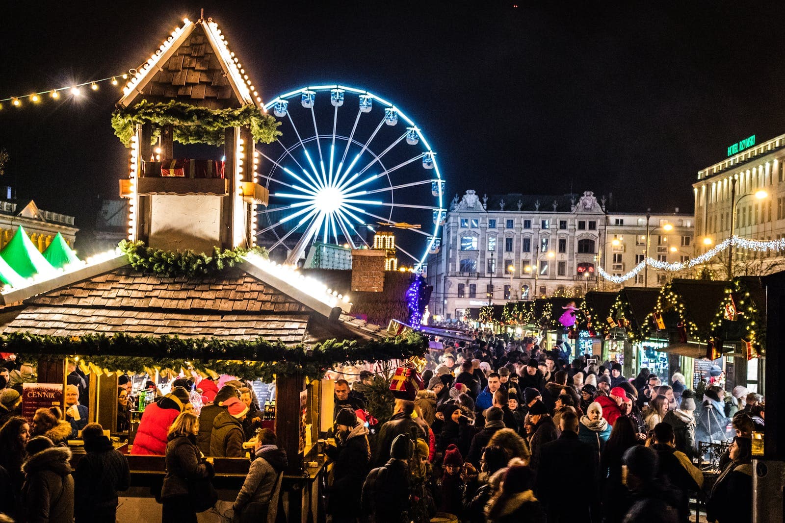 schilderij van een kerstmarkt