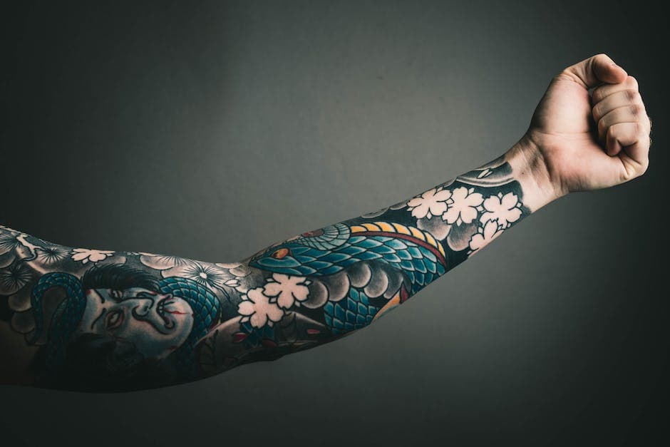 Foto van linkerarm met tatoeage